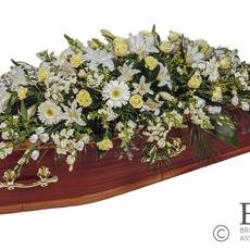 Cream and white casket spray