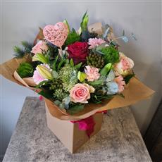 Romantic Pinks With a Red Rose Florist Choice Hand-Tied in Water